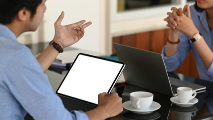 Leinwandbilder - A business development team sitting and work together at the modern working desk.