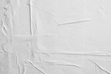 Blank white crumpled and creased paper poster texture background