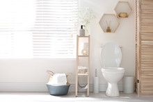 Modern Toilet Bowl In Stylish Bathroom Interior