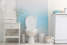 Modern Toilet Bowl In Stylish Bathroom Interior