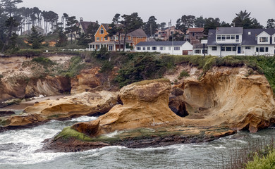 Wall Mural - Rocky coastline of Oregon coast. Close view of Arch rock at depoe Bay. Travel USA.