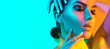 © Subbotina Anna - High Fashion model woman in colorful bright lights, portrait of beautiful sexy girl with trendy make-up and manicure. colorful neon skin, Art design, multicolor make up. Over blue background