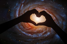 Spiral Galaxy In Heart Shaped Hands Of Astronaut In Space. Romantic Vector Illustration With Hand Silhouette And Astronomical Object In Cosmos. Elements Of This Image Furnished By NASA