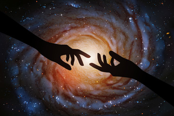 Sticker - reaching hands and spiral galaxy in outer space. romantic vector illustration with hand silhouette a