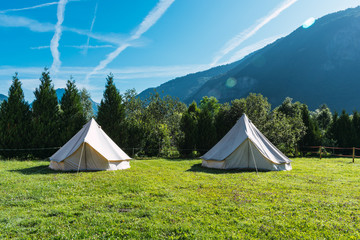 two tipi tents in glamorous camping