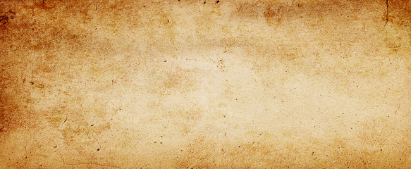Poster - Old brown paper parchment background design with distressed vintage stains and ink spatter and white faded shabby center, elegant antique beige color