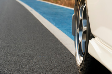 Wall Mural - Road trip driving on asphalt road with bike lens blue color.