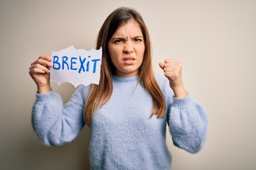 Sticker - Young blonde woman holding brexit banner from political referendum over isolated background annoyed and frustrated shouting with anger, crazy and yelling with raised hand, anger concept