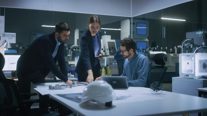 Poster - Modern Factory Office Meeting Room: Diverse Team of Engineers, Managers Talking at Conference Table, Look at Blueprints, Inspect Mechanism, Use Laptop. High-Tech Facility with CNC Machines