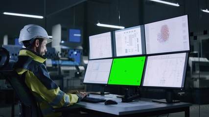 Leinwandbilder - Industry 4.0 Modern Factory: Handsome Male Operator Controls Facility, Uses Computer with Multiple Screens Including: Green Screen / Chroma Key, AI Concept, Machine Learning UI