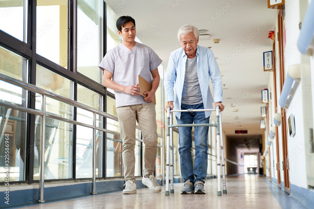 asian old man walking with a walker in rehab center - obrazy, fototapety, plakaty 