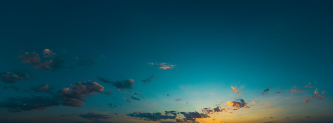 Wall Mural - Beautiful sunset with blue sky and clouds natural background.