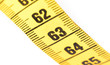 © michaklootwijk - Close-up of a yellow measuring tape isolated on white - 63