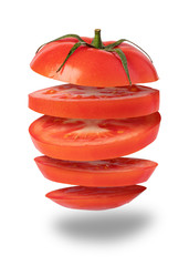 Wall Mural - Flying tomato on white background