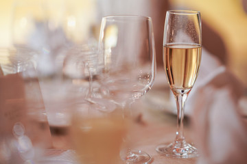 Table setting at a luxury wedding and beautiful champagne on the table.