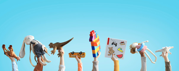 children holding toys, concept of the childhood