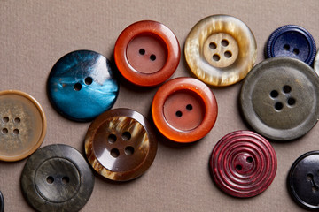 Aufkleber - Background and texture of multicolored antique buttons