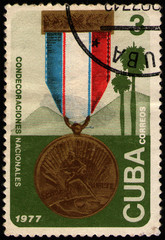 Wall Mural - CUBA - CIRCA 1977: postal stamp 3 Cuban centavos printed by Republic of Cuba, shows Medal with ribbon, circa 1977