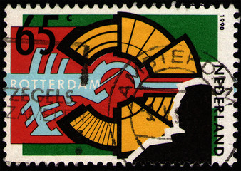 Canvas Print - NETHERLANDS - CIRCA 1990: Postage stamp 65 dutch cents printed in the Netherlands (Holland), shows The city as stage, Bombardment of Rotterdam 1940, circa 1990