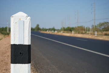 Wall Mural - Pillars at the bend of the road