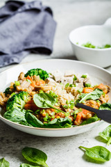 Poster - Lentil vegan stew with mushrooms, quinoa, spinach and broccoli in a bowl. Healthy vegan food concept.