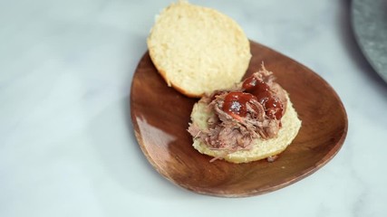 Sticker - BBQ pulled pork sandwich in shape of small sliders with brioche buns.