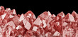 light ruby crystals macro isolated on black