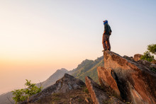 Tourists Stand On A Rock At Doi Pha Tang Noen 104 On February 16,2020 In Chiang Rai,Thailand.