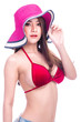 © Sasils Production - Cute asian woman in red bikini, summer hat and jeans isolated in white background. Medium shot, touching hat. Sexy summer concept.