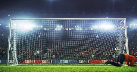 Wall Mural - Goalkeaper fails to cath the ball on the professional football stadium. The ball flies with flames animation.