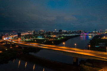 Wall Mural - Crescent Bridge - landmark of New Taipei, Taiwan with beautiful illumination at night, photography in New Taipei, Taiwan.