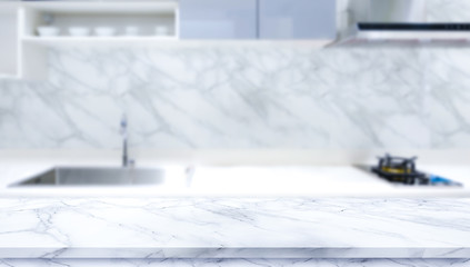 White marble texture  table top on blurred kitchen background