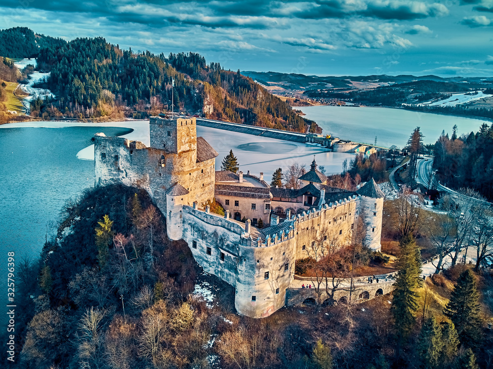 Beautiful panoramic aerial drone view to the Niedzica Castle also known as Dunajec Castle, located in the southernmost part of Poland in Niedzica, Nowy Targ County, Dunajec River, Lake Czorsztyn - obrazy, fototapety, plakaty 