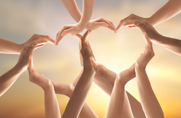 Fototapete - The concept of unity, cooperation, teamwork and charity.