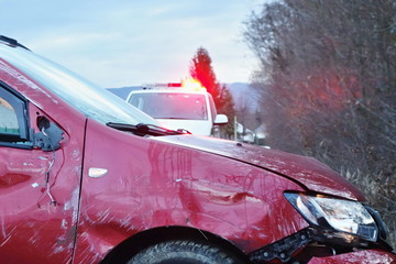 Wall Mural - Car crash. Damaged front of the vehicle. Rescuers and police help with car accident.