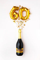 Wall Mural - Happy 60th anniversary party. Champagne bottle with gold number balloon.