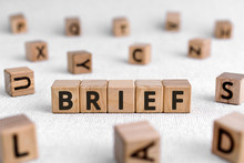 Brief - Words From Wooden Blocks With Letters, Of Short Duration Instruct Or Inform Brief Concept, White Background