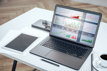 Poster - Laptop with stock chart on screen