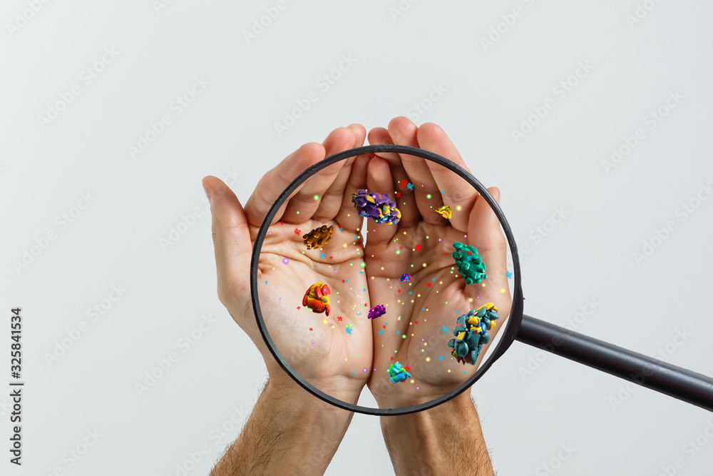 Close up on a sick man hand through magnifying glass transmitting virus by skin contact 3D rendering - obrazy, fototapety, plakaty 