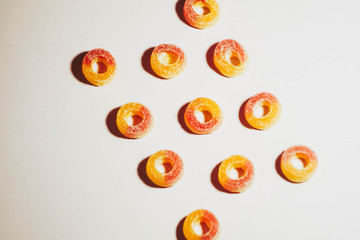 Jelly candies on white background with shard shadow