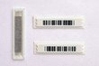 Sticker magnetic barcode top view. label for acoustic systems on a white background. anti-theft barcode sticker