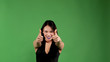 © Oleksandr - Asian girl shows two thumbs outstretched arms forward and smiling, concept of success and joy