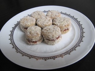 Small cookies rolled in ground nuts.