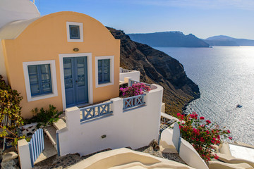 Traditional white buildings facing Aegean Sea in Oia, Santorini island, Greece