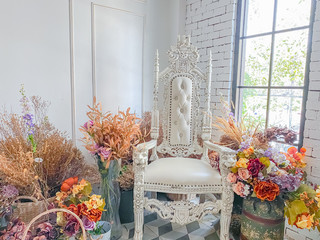 Interior home decor,bouquet and chair with white background.