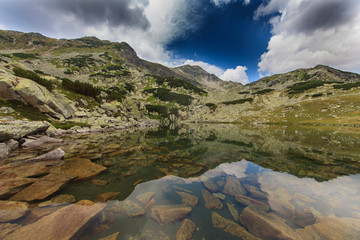 Gorgeous scenery in the Alps in summer, with a beautiful glacier lake