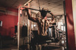 Fitness man working out lat pulldown training at gym