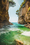 Fototapeta Desenie - view of sea bay between rocks