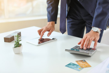 Wall Mural - Male bank manager working in office