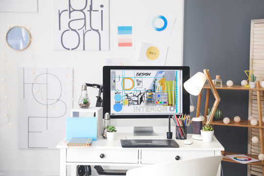 Comfortable workplace of interior designer in office
